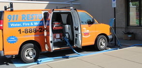 Mold Damage Restoration Van At Exterior Of Job Location